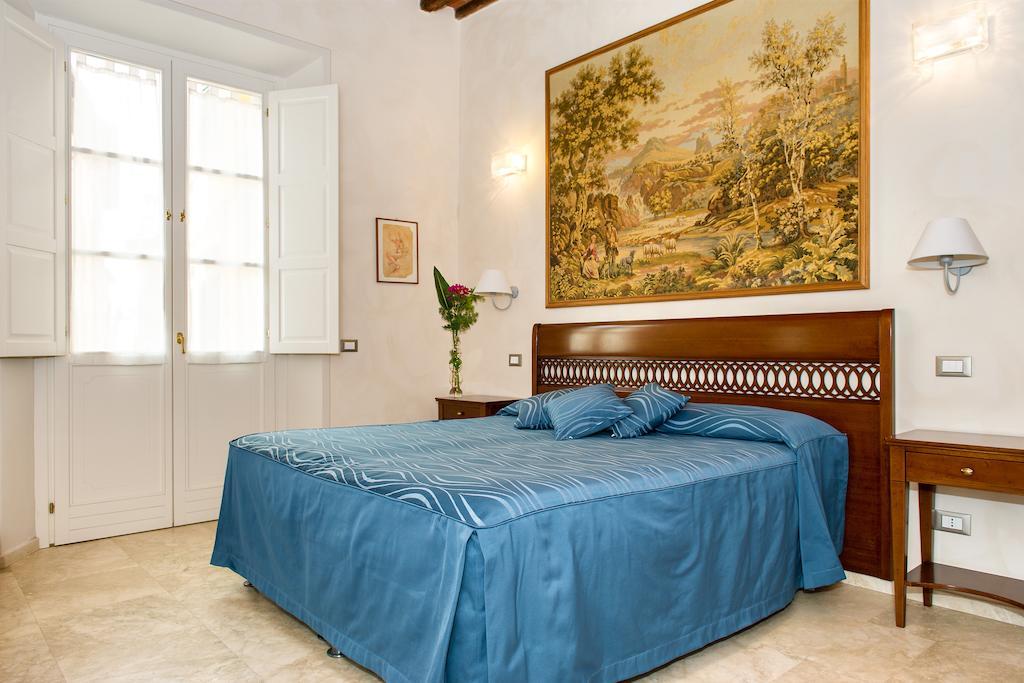 Relais Dei Mercanti B&B And Suites Pisa Szoba fotó